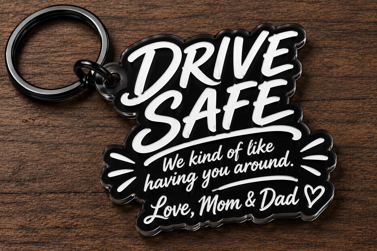 Funny Mom Dad Keychain Gift — alternate angle of the laser engraved studio piece