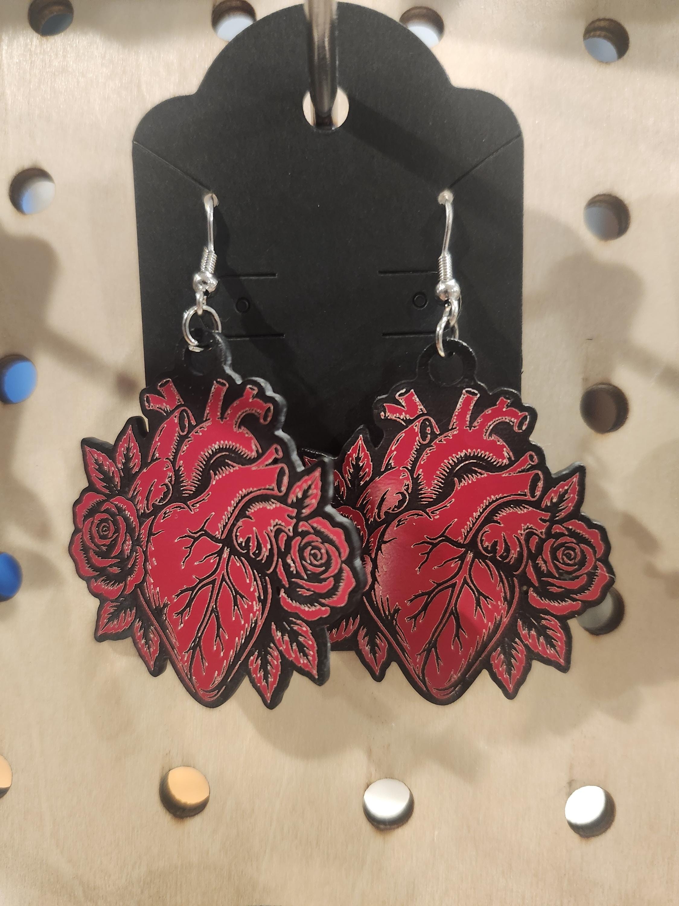 Halloween Earrings — shown styled in a home setting of the laser engraved gothic piece