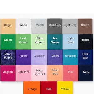 Op de afbeelding: Een kleurenkaart met achtentwintig vierkante tegels in een raster. Elke tegel toont een unieke kleur en een bijbehorend label, waaronder Beige, White, Marble, Dark Grey, Light Grey, Brown, Green, Leaf Green, Mint Green, Sea Green, Light Blue, Black, Galaxy Purple, Purple, Lavender, Violet, Turquoise, Dark Blue, Magenta, Light Pink, Matte Light Pink, Peach Pink, Pink, Navy, Orange, Red en Yellow.