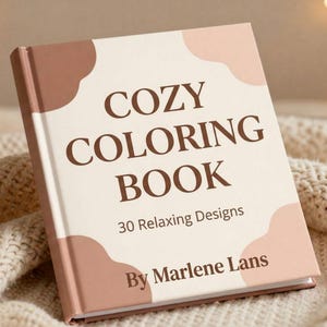 May include: A hardcover coloring book titled "COZY COLORING BOOK" with 30 relaxing designs, by Marlene Lans. The book has a cream-colored cover with brown accents and is resting on a cream-colored knitted blanket.