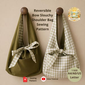 May include: Two reversible slouchy shoulder bags with bow ties, one in solid olive green and one in a light green and white gingham check pattern. Text reads: Reversible Bow Slouchy Shoulder Bag Sewing Pattern, 1 SIZE A4/A0/US Letter, Sewing Pattern, Video Tutorial.