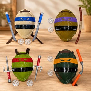 May include: Four turtle shell backpacks with colored eye masks, each paired with matching toy weapons including two blue-handled swords, a wooden staff, two red-handled sai, and orange nunchucks, plus eight small silver-colored throwing star discs.