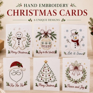 Op de afbeelding: Zes witte wenskaarten met handgeborduurde ontwerpen van een peperkoekmannetje, kerstbal, sneeuwpop, de Kerstman, kerstboom en een krans. De tekst op de kaarten luidt Merry Christmas, Joy to the World, Let it Snow, Ho Ho Ho en Peace and Joy.