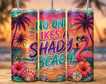 May include: A cylindrical metal tumbler with a straw featuring a tropical sunset beach scene, a pink flamingo wearing sunglasses, hibiscus flowers, seashells, and the text NO ONE LIKES A SHADY BEACH in bold teal and purple lettering.