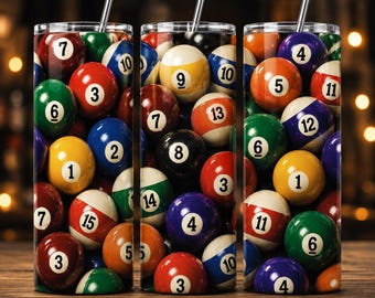 May include: Three cylindrical tumblers featuring a repeating pattern of colorful billiard balls with numbers. Each tumbler has a clear lid and a thin metal straw. The design displays various numbered pool balls in red, blue, yellow, green, and black.