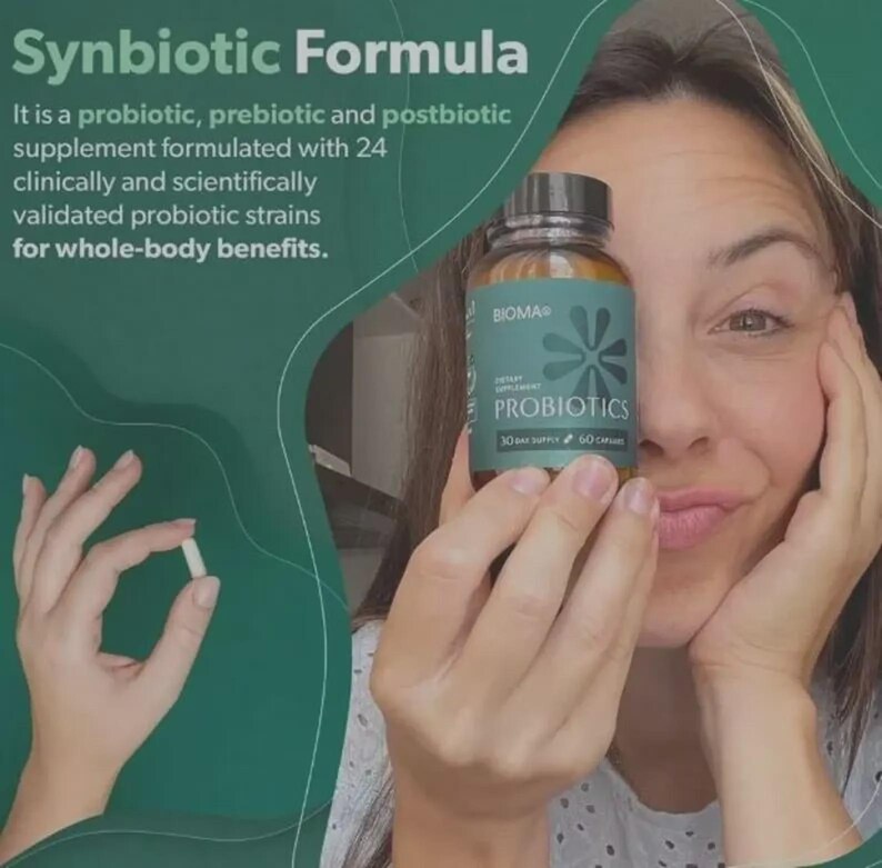 May include: A woman holding a bottle of "PROBIOTICS" dietary supplement and a capsule. The bottle is brown with a teal label and a black cap. The label includes the brand name "BIOMA" and the text "30 day supply 60 capsules". The background is teal.