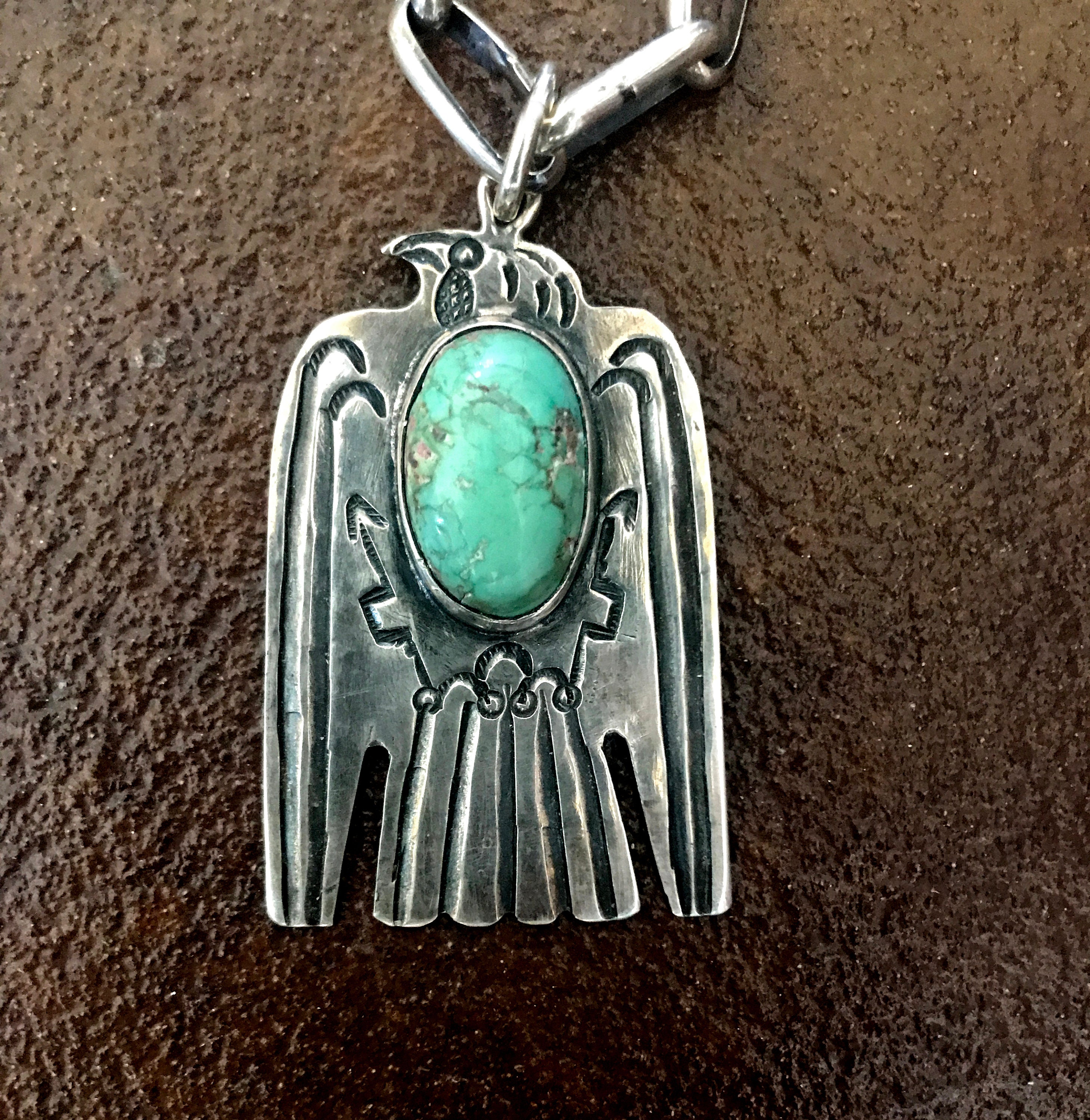 Turquoise thunderbird pendant Clearance