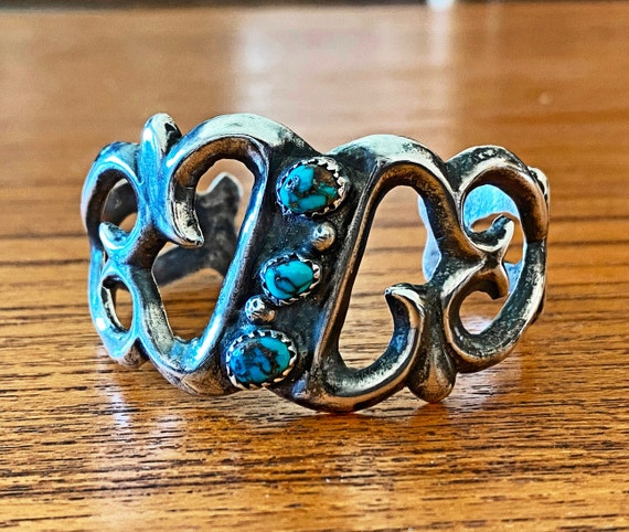 Navajo Arthur J Williams Sand Cast Cuff Bracelet with 3 Bisbee Turquoise Stones