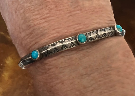 Navajo Stamped Carinated Bracelet with 3 Turquoise Stones