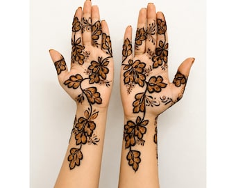 May include: Two open palms and forearms featuring intricate dark brown henna designs. The pattern consists of a continuous vine motif with detailed leaves and small swirling accents that extend from the wrists up to the fingertips.