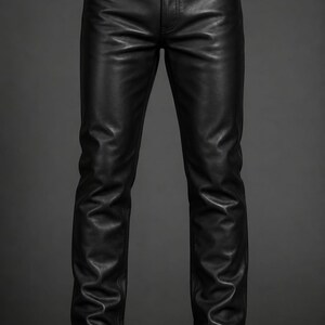 May include: Black leather trousers with a classic five-pocket design. The trousers have a straight leg cut and a button and zip closure. The leather appears smooth with a slight sheen. Suitable for various occasions, these trousers are a wardrobe staple.