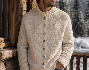 May include: A cream-colored, long-sleeved knit cardigan featuring a ribbed mock neck collar, ribbed cuffs, and a vertical row of dark, circular buttons down the front. The garment is crafted from a textured, chunky knit fabric with a subtle speckled pattern.