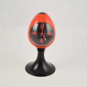 Red alarm clock black pedestal tulip shape made in Germany. image 1