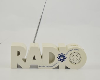 Radio radio Model in the form of the word radio AM frequency works FM frequency NOT