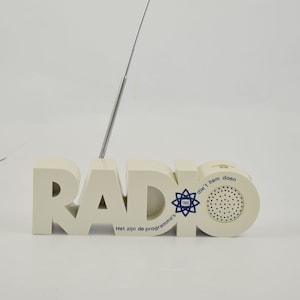 Radio radio Model in the form of the word radio AM frequency works FM frequency NOT