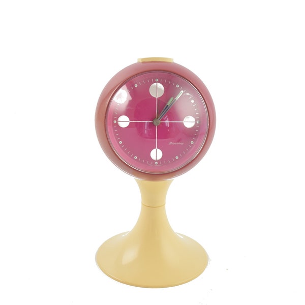 Pedestal alarm clock in a tulip shape, made by Blessing, west Germany, in the early seventies.