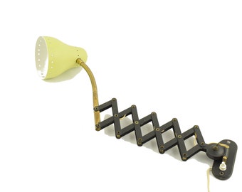 Scissors wall light yellow scissors wall lamp from the 60s from Dutch company hala