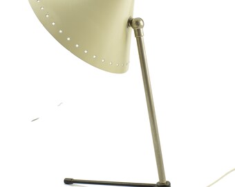 creme-white Pinocchio wall or table lamp designed in 1956 by H.Th.A. Busquet