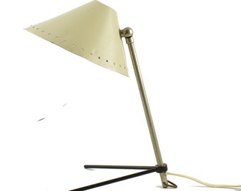 creme-white Pinocchio wall or table lamp designed in 1956 by H.Th.A. Busquet