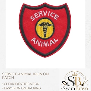 May include: A shield-shaped embroidered patch with a red background and a black border. The text SERVICE ANIMAL is stitched in white. In the center, a yellow circle contains a black caduceus symbol. The patch features a clean, stitched edge.