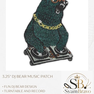 May include: An embroidered patch measuring 3.25 inches featuring a dark green bear wearing orange-rimmed sunglasses and a gold chain, positioned behind a black and white DJ turntable console with records, rendered in detailed thread work.
