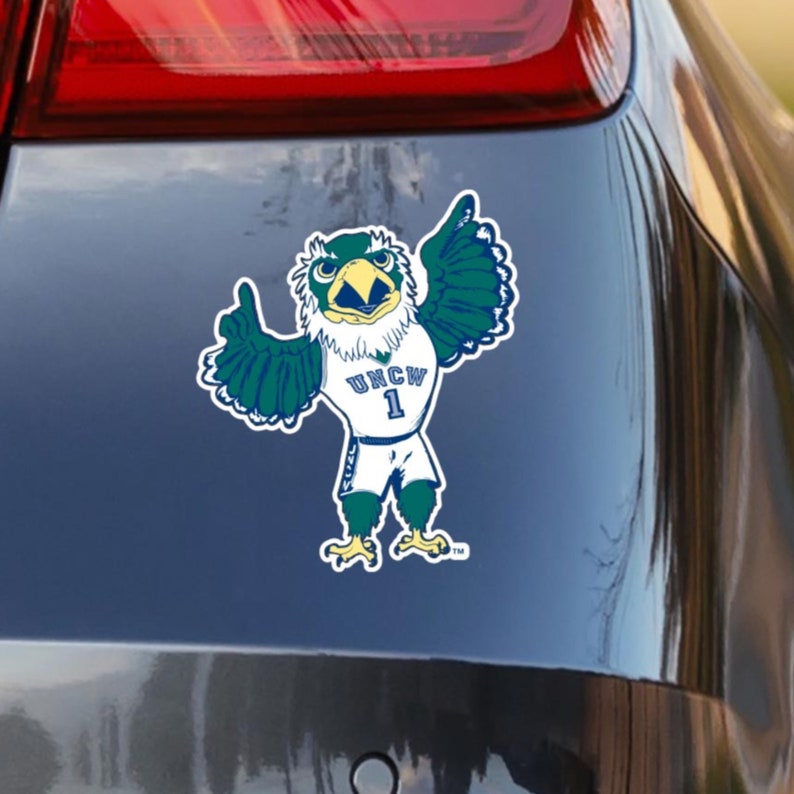 UNC Wilmington Sammy C Hawk Mascot in Uniform Car Decal Sticker displayed on car. A University of North Carolina Wilmington sticker also looks great on windows, laptops, water bottles, corn hole boards, coolers, anywhere! Perfect for UNCW fanatics.