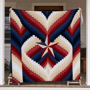 May include: A large quilt featuring a geometric star pattern in the center, composed of red, white, and blue fabric strips arranged in a chevron design. The star is navy blue with white stars, and the surrounding fabric creates a vibrant, layered effect.