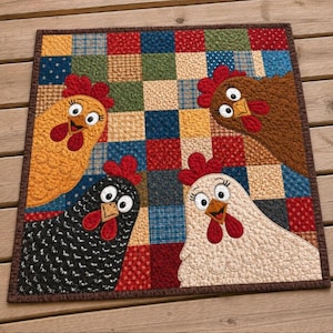May include: A square quilted wall hanging featuring a patchwork grid of multicolored fabric squares. Four appliquéd chickens in yellow, brown, black, and white are positioned at the corners, each with a red comb, wattle, and large eyes.
