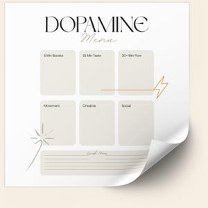 May include: A white paper titled "Dopamine Menu" with a minimalist design. The top of the page features the title in a stylish font. Below are six rectangular boxes with labels like "5 Min Boosts" and "Movement". A gold arrow and starburst graphic are also present.