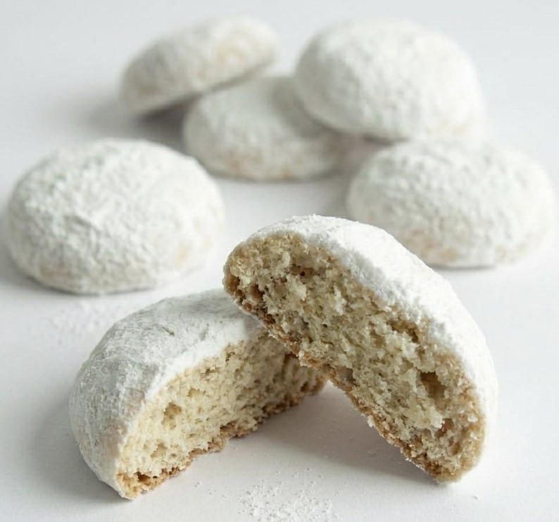 ~Italian Wedding Cookie~ 
A refined Italian Wedding Cookie crafted with an exquisitely tender, melt-in-your-mouth texture and a delicate hint of toasted pecan. Each buttery bite is finished in a soft veil of powdered sugar, creating a light, snowy elegance that feels both nostalgic and indulgent. Gracefully simple yet decadent, it’s the perfect cookie for gifting, celebrations, or an elevated sweet moment.
Approximately 31 cookies per pound, offering a beautifully abundant and shareable treat.