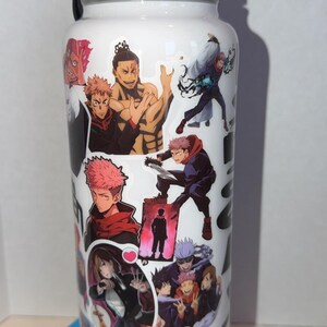 May include: White stainless steel water bottle featuring multiple anime character stickers. The bottle has a black lid and handle. The stickers depict various characters in action poses, with vibrant colors and detailed artwork. The bottle sits on a blue base.