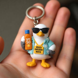 Portachiavi gabbiano Sunscreen Mafia, accessorio per uccelli costieri stampato in 3D e dipinto a mano.