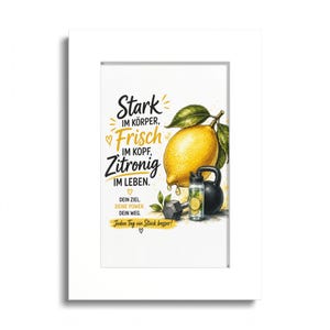 May include: A framed wall art print featuring a large yellow lemon with green leaves, a black kettlebell, a gray dumbbell, and a clear water bottle with lemon slices. The text reads: Stark im Körper, Frisch im Kopf, Zitronig im Leben. Dein Ziel. Deine Power. Dein Weg. Jeden Tag ein Stück besser!