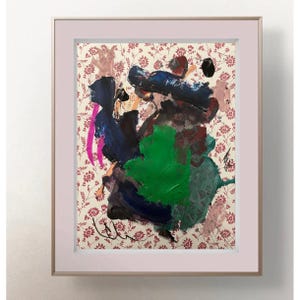 May include: A framed artwork featuring a cream-colored background with a repeating pattern of small red flowers and vines. Overlaid on this pattern are bold, thick, abstract brushstrokes in shades of dark blue, bright green, black, and pink.