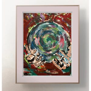 May include: A framed abstract painting featuring a central swirling vortex of teal, green, and blue paint strokes. The background consists of bold, layered brushwork in deep red, brown, and black tones, creating a textured and expressive composition.