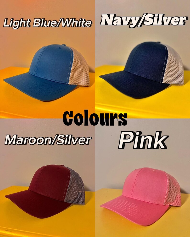 May include: Four baseball caps with mesh backs displayed in a grid. Top left: Light Blue/White cap. Top right: Navy/Silver cap. Bottom left: Maroon/Silver cap. Bottom right: Pink cap. Each hat features a solid front panel and a breathable mesh back.