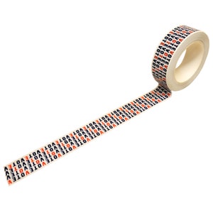 May include: A roll of white decorative tape with the word "VOTE" printed repeatedly in alternating red and black. The tape is unrolled, showing the repeating pattern. The background is white.