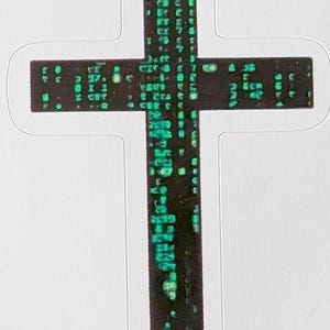 May include: A cross-shaped sticker featuring a black background with vertical columns of glowing green digital code characters. The design mimics a computer data stream pattern, and the sticker has a thin, clear die-cut border around the entire shape.