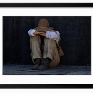 Photograph of a Civil War Bugle Boy at rest. Vintage clothing Civil War