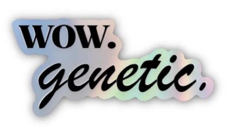 May include: Holographic sticker featuring the text "WOW. genetic." in a black, bold, cursive font. The sticker has a rounded, cloud-like shape and a shimmering, iridescent finish, reflecting a range of colours.