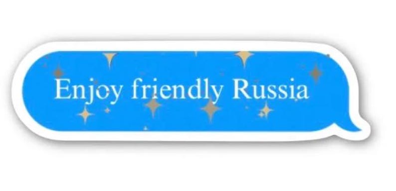 May include: A blue sticker in the shape of a speech bubble with the text "Enjoy friendly Russia" in white. The sticker has gold star accents.