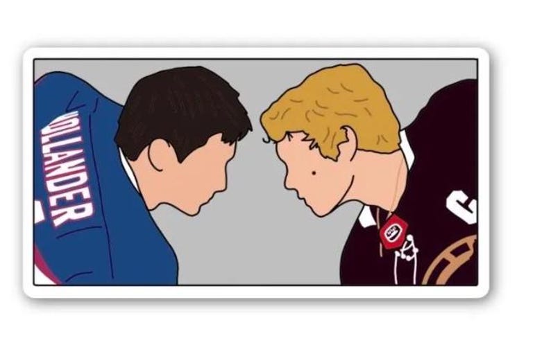 May include: A sticker with a cartoon illustration of two people facing each other. One is wearing a blue jacket with the name "HOLLANDER" on the back, and the other is wearing a black jersey. The background is grey.