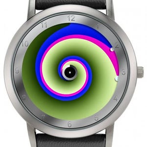 May include: Silver-tone wristwatch with a black leather band. The watch face features a green, blue, and pink spiral design. The watch has a silver bezel and a black leather strap.