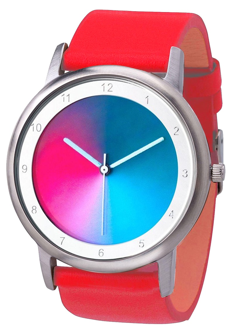 May include: A wristwatch with a silver-colored case and a vibrant, color-blocked face. The watch face is divided into pink and blue sections. It has white hands and a bright red leather band.