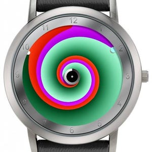 May include: Silver wristwatch with a black leather band. The watch face features a colorful spiral design in shades of green, red, purple, and white. The watch has a silver bezel and a black leather strap.