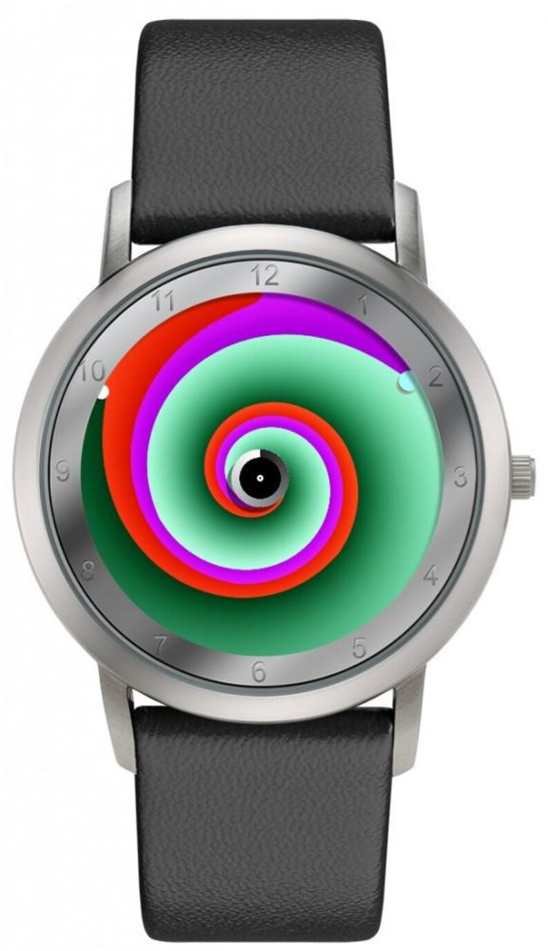 May include: Silver wristwatch with a black leather band. The watch face features a colorful spiral design in shades of green, red, purple, and white. The watch has a silver bezel and a black leather strap.
