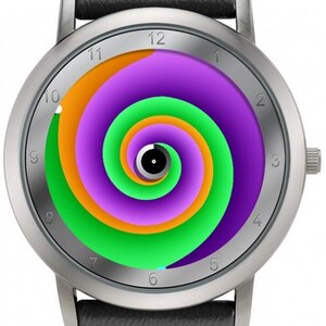 May include: Silver wristwatch with a black leather band. The watch face features a colorful spiral design in shades of purple, green, orange, and white. The watch has a silver bezel and a black leather strap.