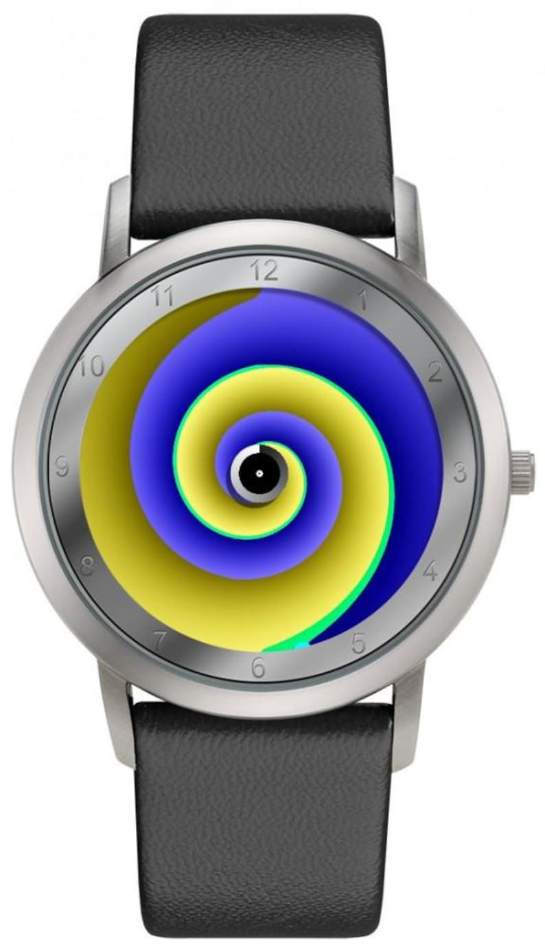 May include: A silver wristwatch with a black leather band. The watch face features a spiral design in yellow, blue, and green. The watch has a silver bezel and a black leather strap.