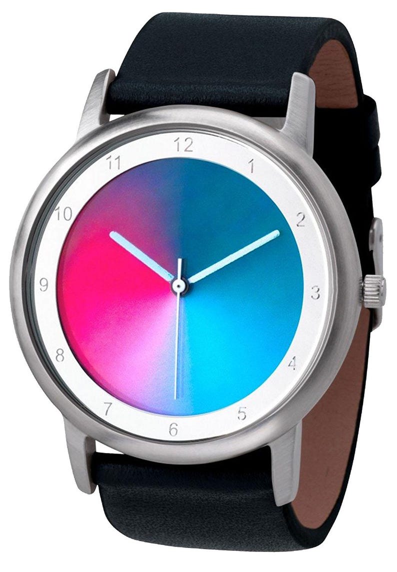 May include: A wristwatch with a silver-colored case and a black leather band. The watch face features a gradient of pink and blue, with white hands and hour markers. The watch band is approximately 0.75 inches wide.