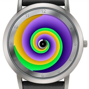 May include: Silver wristwatch with a black leather band. The watch face features a colorful spiral design in yellow, green, and purple. The watch has a silver bezel and a black leather strap.